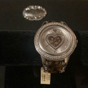 New Brighton, tortoise, and Crystal watch